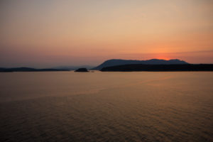 Sea in evening mood, islands and mountains in the background, Canada Sea in evening mood, islands and mountains in the background, Canada